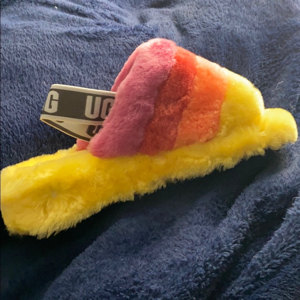 SIZE 8. Women’s UGG slides. Never worn.